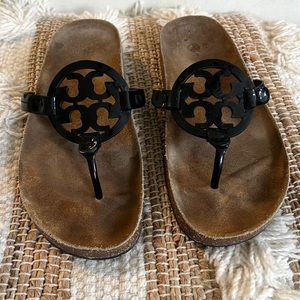 Tory Burch sandals.